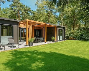 Enjoy the serene Bos Lodge in Maasbree, North Limburg, with a spacious terrace and green surroundings for eight people.