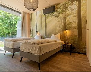 Attraktives Schlafzimmer der Bos Villa DeLuxe XL in Maasbree, Nord-Limburg. Genieen Sie Ruhe und Natur in diesem Luxus-Ferienhaus fr 4 Personen.