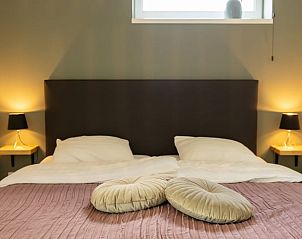 Sfeervolle slaapkamer in Vakantiehuis in Baexem, Noord Limburg voor een goede nachtrust.