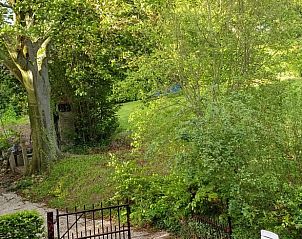 Green view from Cottage in Mechelen, vacation home in South Limburg, surrounded by lush nature and peaceful surroundings.