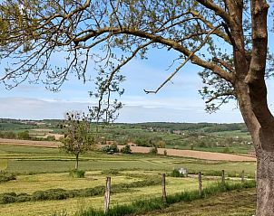 View of rolling countryside from Cottage in Mechelen, South Limburg, vacation home surrounded by nature and tranquility.