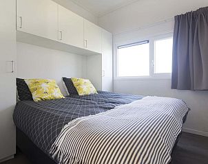 Comfortabele slaapkamer in Module 6 personen vakantiehuis Schin op Geul, Zuid Limburg met moderne inrichting en veel licht.