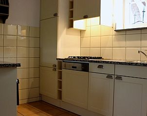 Modern kitchen in Holiday Home in Gulpen, South Limburg, with stylish furnishings and ample storage for a comfortable stay.