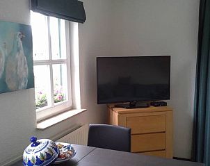 Gemtliche Essecke im Ferienhaus in Epen, Sdlimburg, Ferienhaus mit Malerei und moderner Einrichtung.