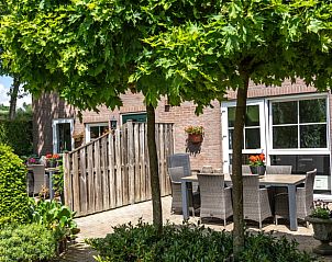 Enjoy the green outdoor space at Holiday Home in Gulpen - Wittem, located in picturesque South Limburg, perfect for relaxation.