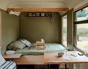 Ruime binnenkant van Huisje in Wahlwiller, vakantiehuis in Zuid Limburg, met gezellige zithoek.