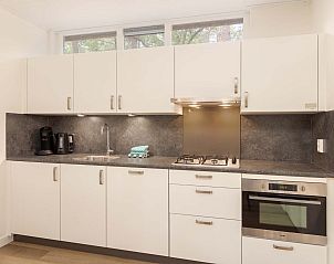 Slaapkamer in vrijstaande woning in Vlierden, vakantiehuis De Peel, Noord Brabant met uitzicht op de natuur.