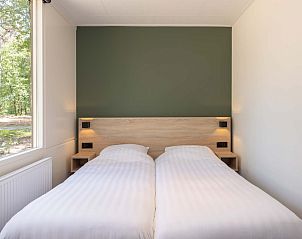 Tweede slaapkamer in vrijstaande woning in Vlierden, vakantiehuis De Peel, Noord Brabant met comfortabele bedden.