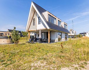 Stijlvolle zithoek in vakantiehuis 10-persoonsbungalow 10EL, Someren, Noord Brabant.