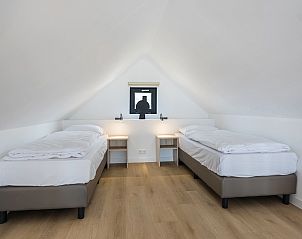 Buitenkant van 4-persoonslodge 4B3 in Someren, omgeven door groen in De Peel, Noord Brabant.