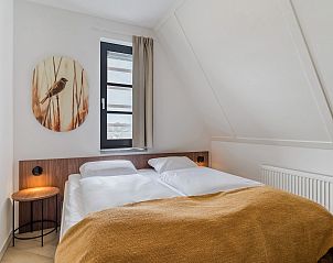 Comfortabele slaapkamer in 12-persoonsbungalow 12EL1, Someren, De Peel, Noord Brabant.