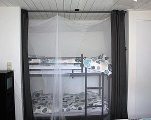 Kinderkamer met stapelbed in Vakantiehuisje in Aarle-Rixtel, De Peel, ideaal voor gezinnen.