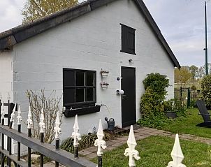 Vakantiehuisje in Aarle-Rixtel, Noord Brabant, met gezellige buitenruimte en omheinde tuin.