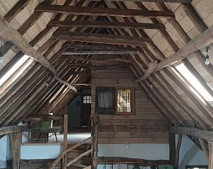 Houten balken in het interieur van Huisje in Aarle-Rixtel, vakantiehuis in Aarle-Rixtel.