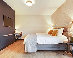 Luxe slaapkamer met moderne inrichting in Huisje in Milheeze, vakantiehuis in De Peel, Noord Brabant.