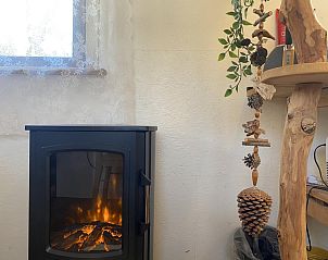 Warmer Holzofen in Pipowagen het Oventje in Zeeland, De Peel, Nordbrabant fr einen gemtlichen Aufenthalt.