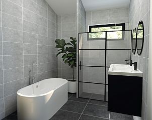 Luxe badkamer in de recreatiewoning in Bakel, De Peel, Noord Brabant met ligbad en moderne afwerking.