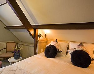 Gezellige slaapkamer in Vakantiehuisje in De Rips, De Peel, Noord Brabant, met comfortabele inrichting en sfeervolle verlichting.