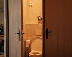 Modern bathroom in Holiday Home in Bergeijk with stylish finishes and practical amenities.