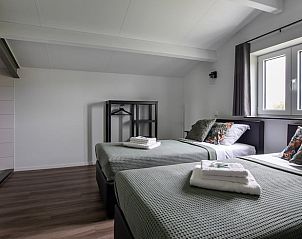 Tweepersoonskamer met uitzicht in Vakantiehuisje in Hapert, Kempen, Noord Brabant.