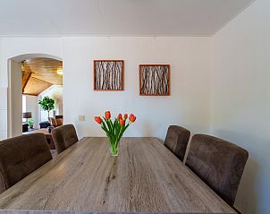 Keuken met toegang tot terras in Achter de Vijf Linden, vakantiehuis in Knegsel.