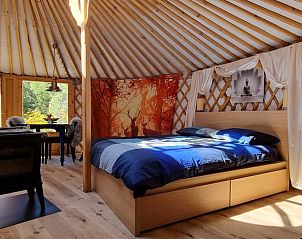 Slaapruimte in Vakantiehuisje in Liempde, Noord Brabant met natuurlijk licht en knusse inrichting.