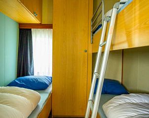 Knusse kinderkamer met stapelbedden in Vakantiehuis Duinhoeve, Udenhout, ideaal voor gezinnen in Noord Brabant.