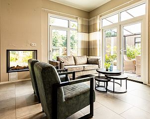 Ruime woonkamer met uitzicht in Belvedere 4 personen Wellness, ontspannen vakantiehuis in Cromvoirt, Noord Brabant.