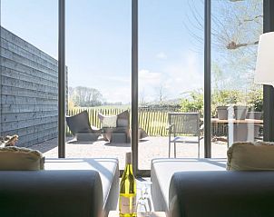 Sunny terrace with view at Cottage in Moergestel, vacation home in Heart of Brabant, North Brabant.