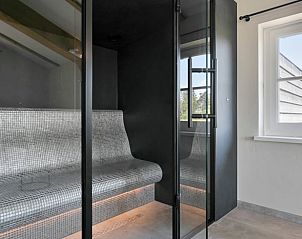 Open living room in Holiday home in Moergestel, Heart of Brabant, overlooking the garden.