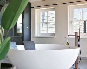Stylish bathtub in Holiday Home in Moergestel, Heart of Brabant, with modern touches.