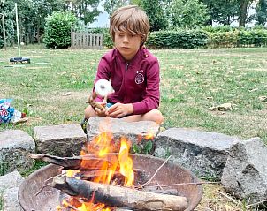 Kampvuur plezier bij Huisje in Kaatsheuvel, vakantiewoning in Kaatsheuvel, Noord Brabant.