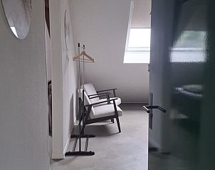 Zithoek in Vakantiehuisje in Hank, Noord Brabant, biedt een gezellige plek om te ontspannen in het Hart van Brabant.