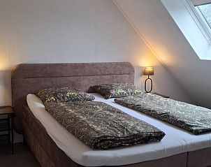 Comfortabele slaapkamer in Vakantiehuisje in Hank, Noord Brabant, met ruime bedden voor een goede nachtrust in Hart van Brabant.