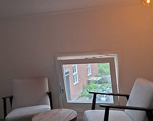 Gezellige zithoek met uitzicht in Huisje in Hank, Hart van Brabant, Noord Brabant.