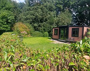 Vakantiehuisje in Berlicum omgeven door groene natuur, ideaal voor een ontspannen verblijf in Hart van Brabant, Noord Brabant.