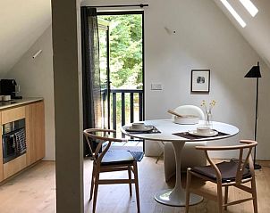 Gezellige eetruimte in Huisje in Loon op Zand, ideaal voor een vakantie in Hart van Brabant.