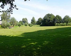 Ruime tuin met bomen bij Vakantiehuis in Loon op Zand, perfect voor ontspanning, Hart van Brabant, Noord Brabant.