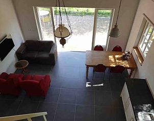 Luchtig interieur van Vakantiehuis in Loon op Zand met eet- en zithoek, Hart van Brabant, Noord Brabant.