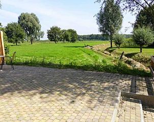 Ruim terras met prachtig uitzicht op natuur bij Vakantiehuis in Loon op Zand, Hart van Brabant, Noord Brabant.