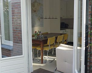 Open deuren naar terras in Vakantiehuis in Loon op Zand, geniet van binnen en buiten in Hart van Brabant, Noord Brabant.