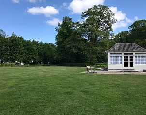 Uitgestrekt gazon bij Vakantiehuisje in Loon op Zand, Noord Brabant.