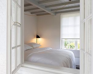 Slaapkamer in Vakantiehuisje in Loon op Zand met serene sfeer, Noord Brabant.