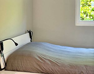 Slaapkamer in Huisje in Tilburg, vakantiewoning in Hart van Brabant, Noord Brabant.