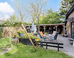 Vakantiehuis in Schaijk, Noordoost Brabant met zonnig terras en gezellige buitenruimte.