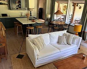 Open keuken en eetruimte in Vakantiehuisje in Schaijk, ideaal voor culinaire avonturen.