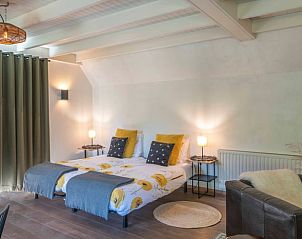 Slaapkamer met gezellige verlichting in Vakantiehuisje in Oeffelt, Noord Brabant.