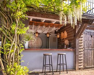 Buitenbar van Huisje in Oeffelt, vakantiehuis in Noordoost Brabant met gezellige sfeer.