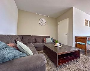 Gezellige woonkamer van Weidezicht vakantiehuis in Odiliapeel, Noordoost Brabant, met comfortabele zithoek.