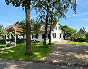 Gezellig Huisje in Gemert, Noordoost Brabant, omgeven door bomen en natuur.